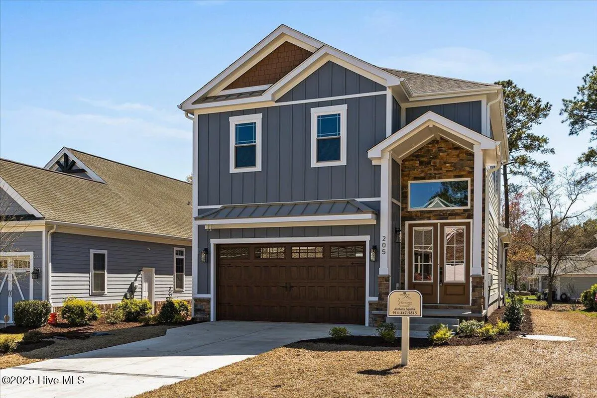 Property Slideshow image 1 of 60 | 205 brookwood park ct, Sunset Beach, NC, 28468