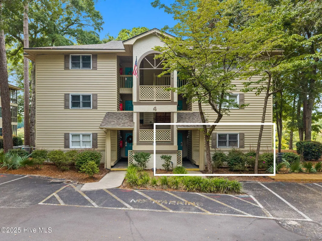 Property Slideshow image 1 of 73 | 219 clubhouse rd 2, Sunset Beach, NC, 28468