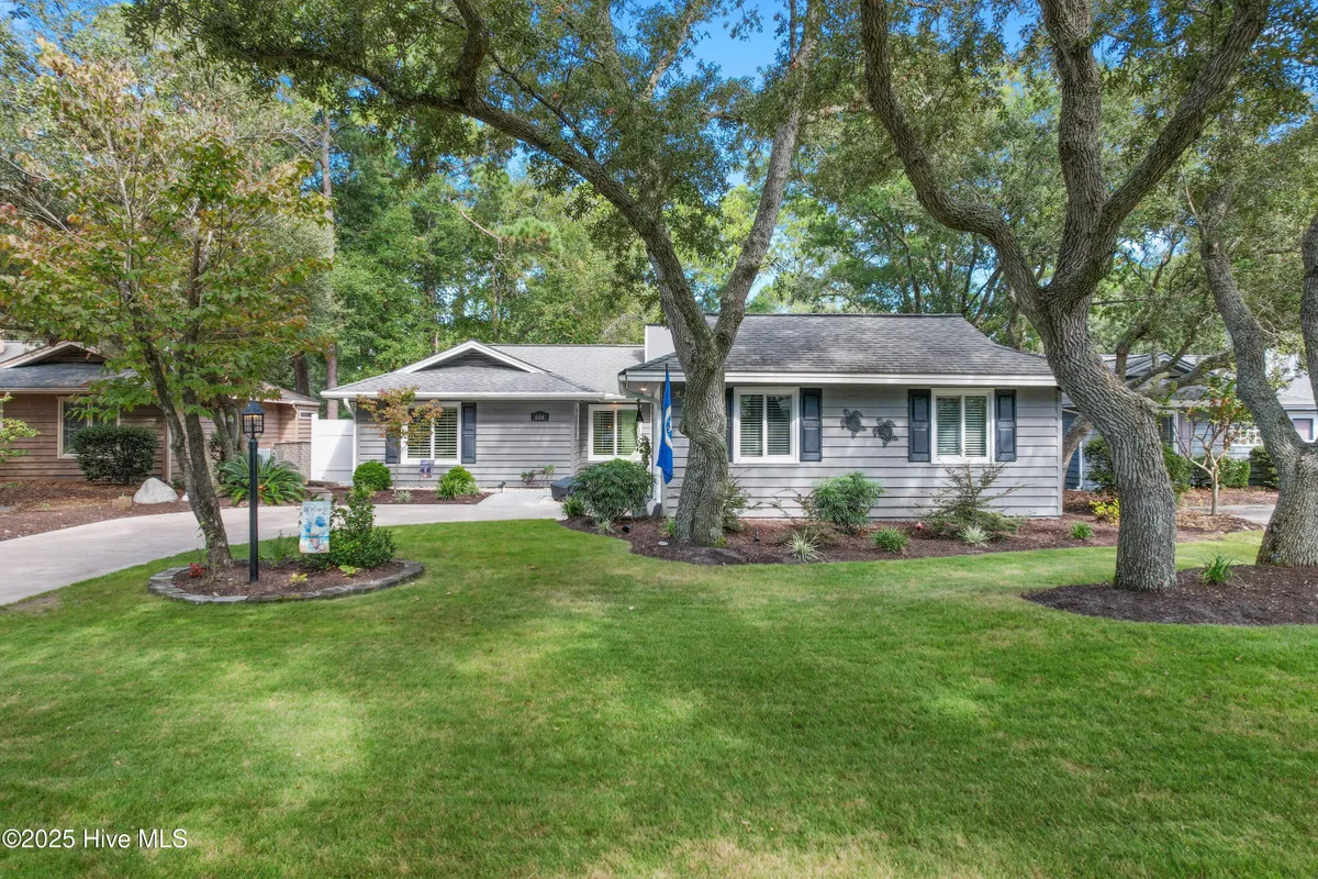 Property Slideshow image 1 of 64 | 606 camellia ln, Sunset Beach, NC, 28468