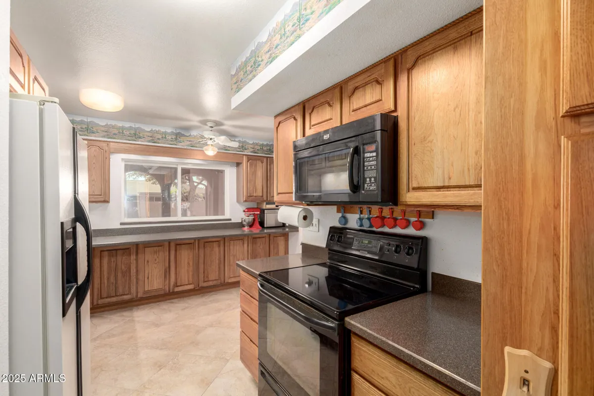 Property Slideshow image 1 of 34 | 9723 w wrangler dr, Sun City, AZ, 85373