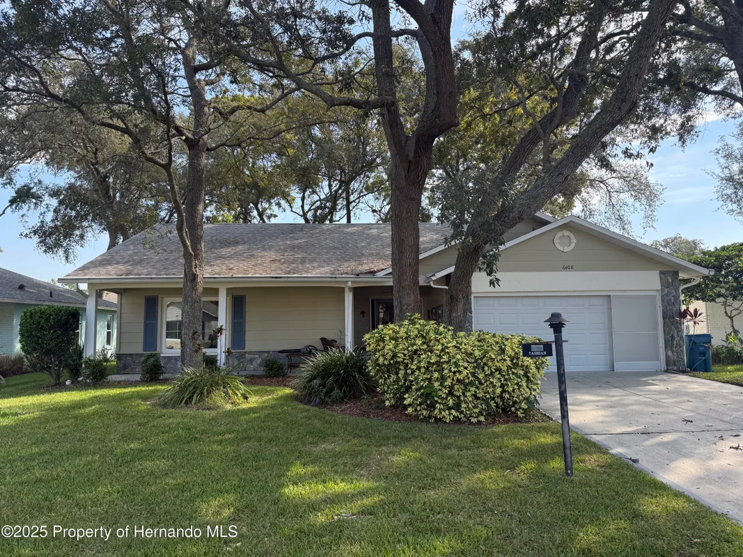 Property Slideshow image 1 of 67 | 6408 pine meadows dr, Spring Hill, FL, 34606