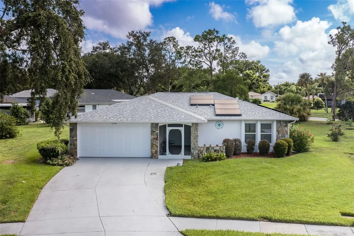 Property Slideshow image 1 of 39 | 11210 elderberry dr, Port Richey, FL, 34668