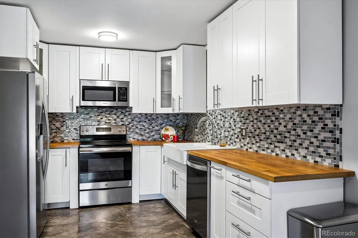 Property Slideshow image 1 of 49 | 715 s clinton st 2b, Denver, CO, 80247