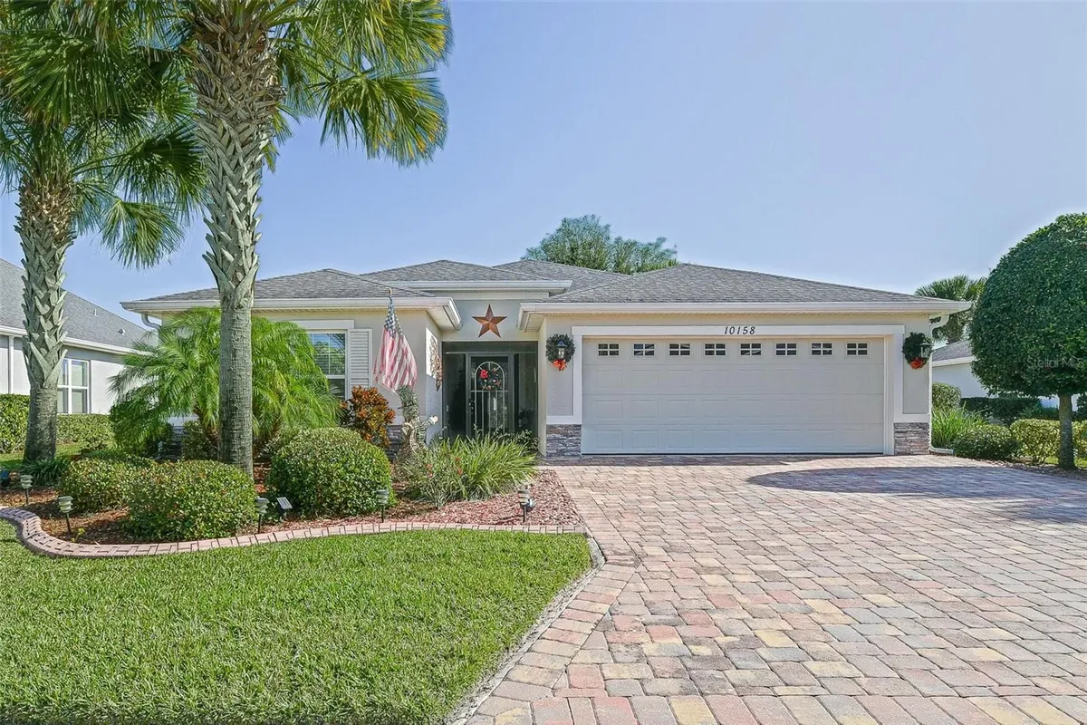 Property Slideshow image 1 of 64 | 10158 julia isles ave, Oxford, FL, 34484
