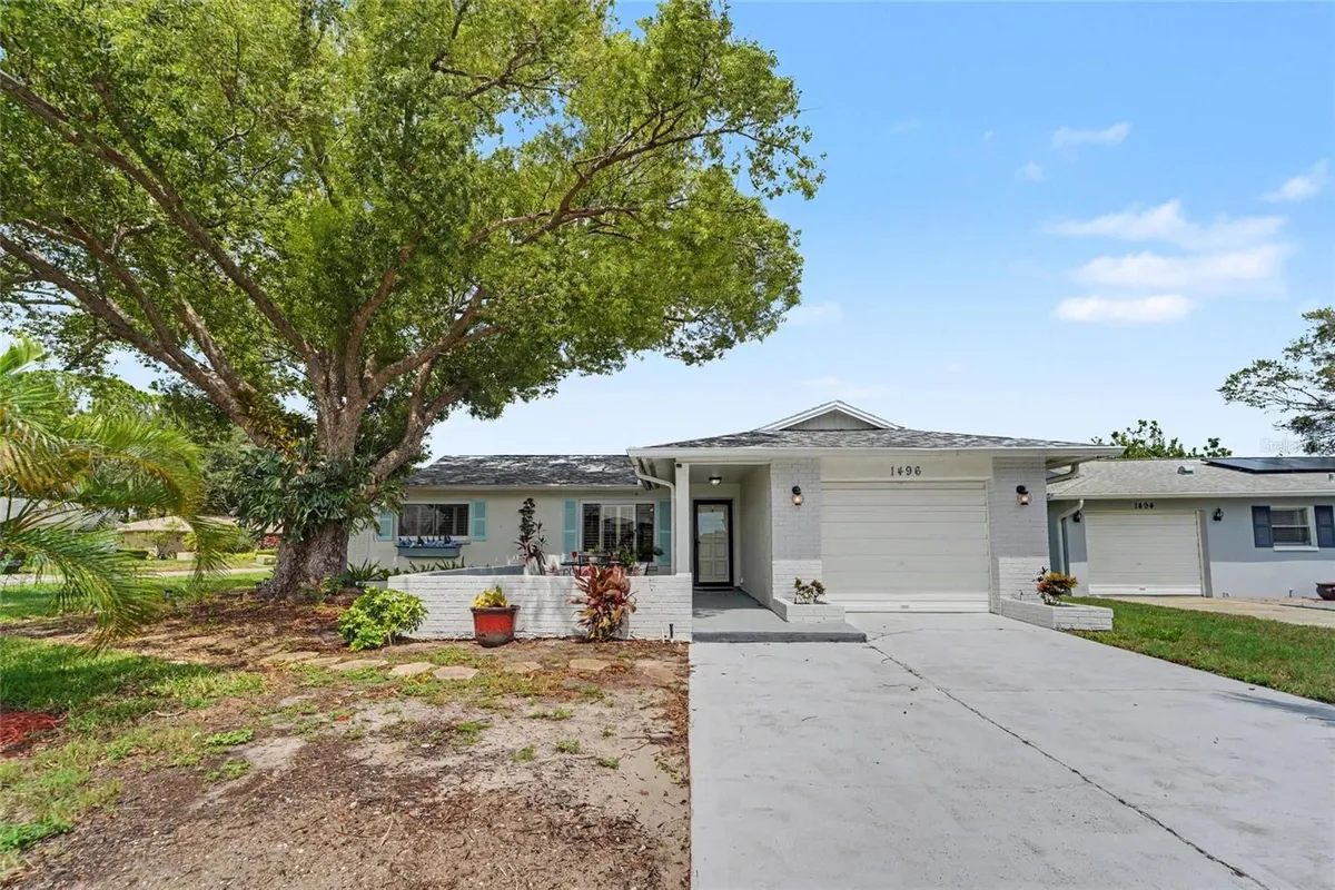 Property Slideshow image 1 of 37 | 1496 queen anne blvd, Palm Harbor, FL, 34684