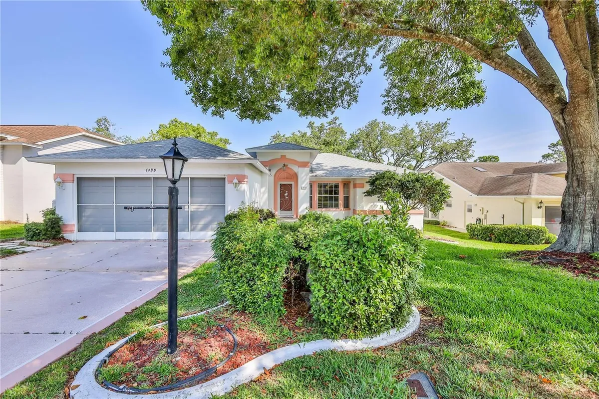 Property Slideshow image 1 of 81 | 7499 blue skies dr, Spring Hill, FL, 34606