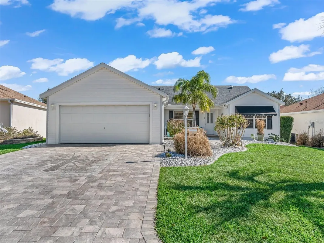 Property Slideshow image 1 of 54 | 16975 se 91st shubrick ct, The Villages, FL, 32162