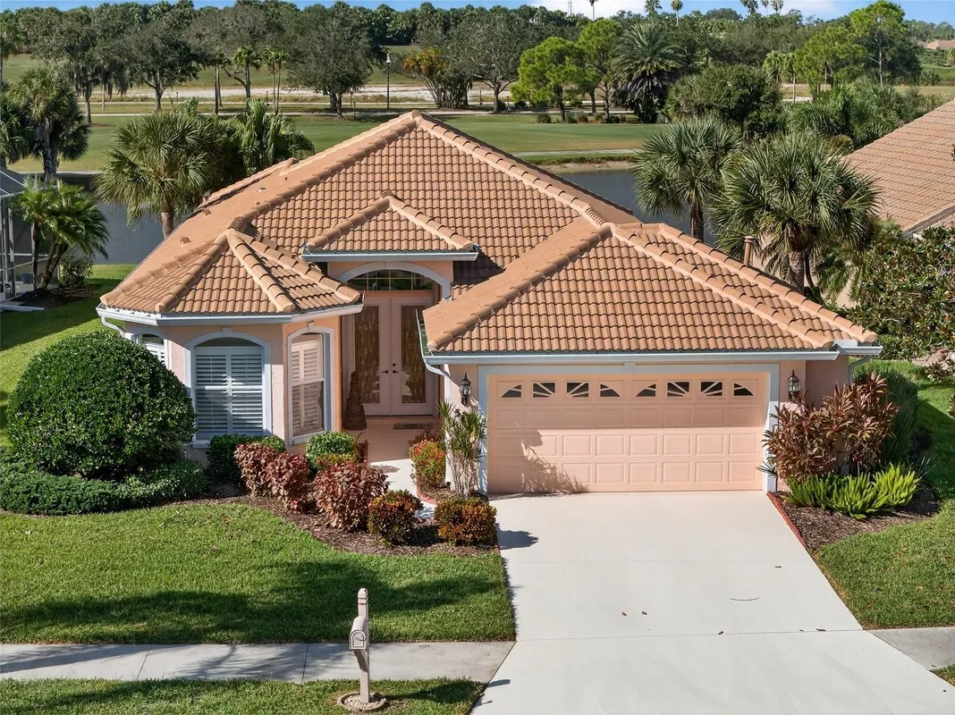 Property Slideshow image 1 of 54 | 5151 pine shadow ln, North Port, FL, 34287