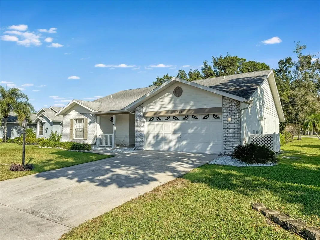Property Slideshow image 1 of 29 | 2436 deer trail ln, Spring Hill, FL, 34606