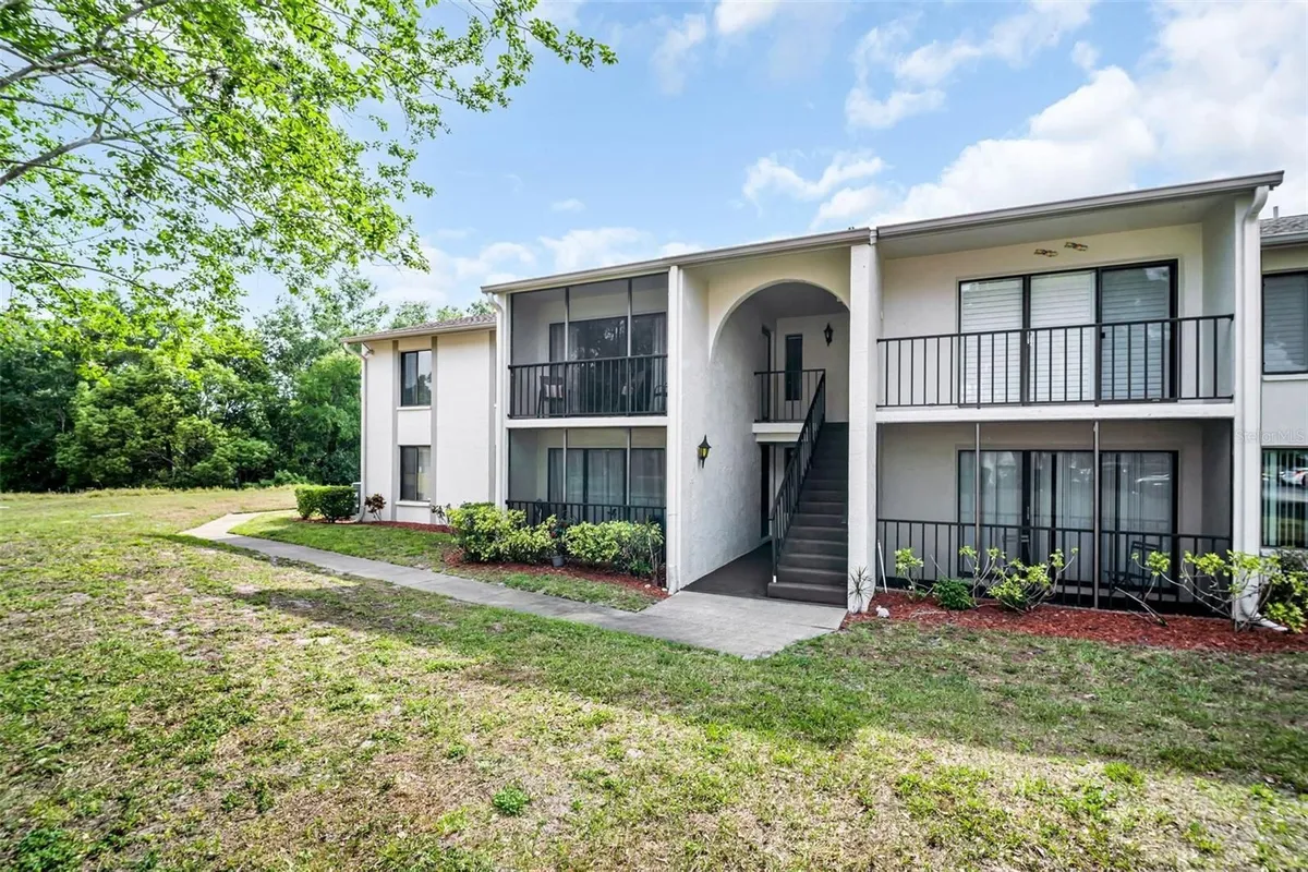 Property Slideshow image 1 of 32 | 2642 pine ridge way g2, Palm Harbor, FL, 34684