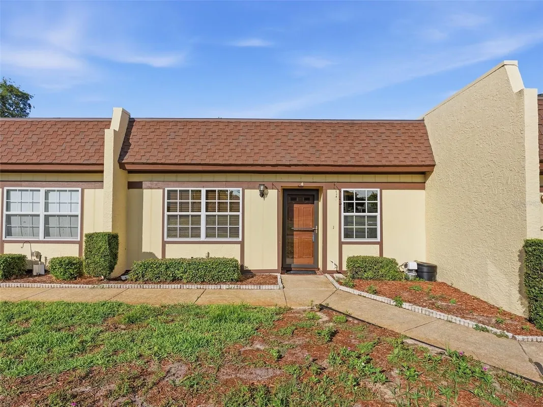 Property Slideshow image 1 of 44 | 11430 carriage hill dr 4, Port Richey, FL, 34668