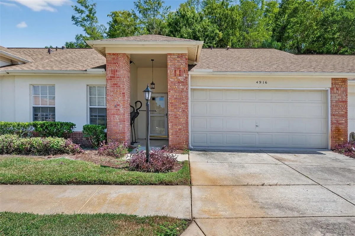 Property Slideshow image 1 of 53 | 4916 troon ln, New Port Richey, FL, 34655