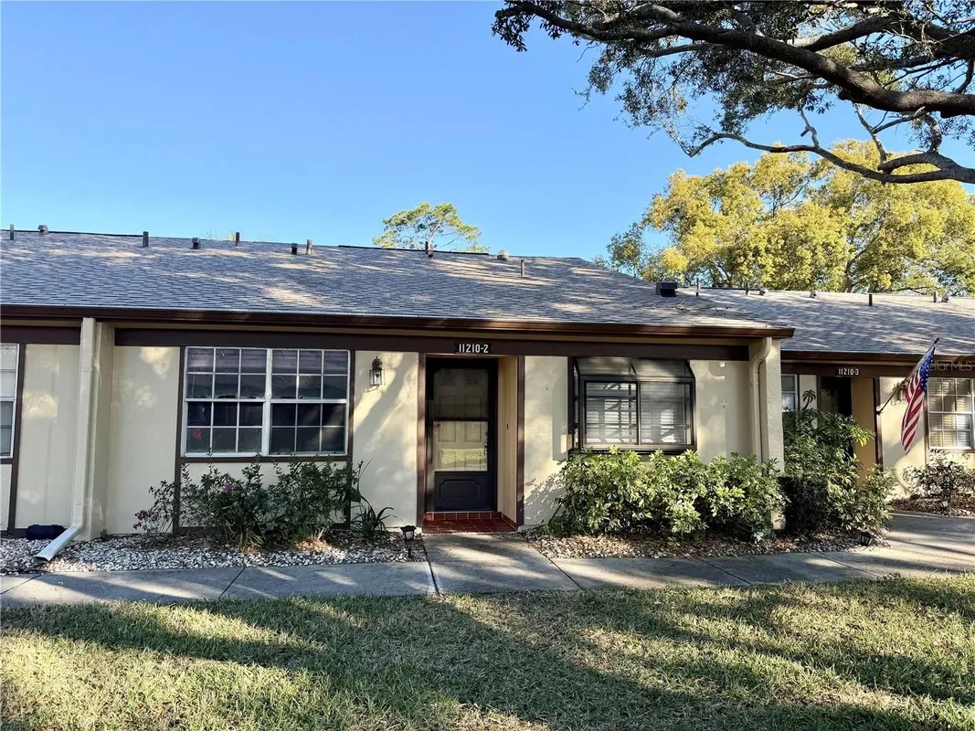 Property Slideshow image 1 of 15 | 11210 dollar lake dr 2, Port Richey, FL, 34668