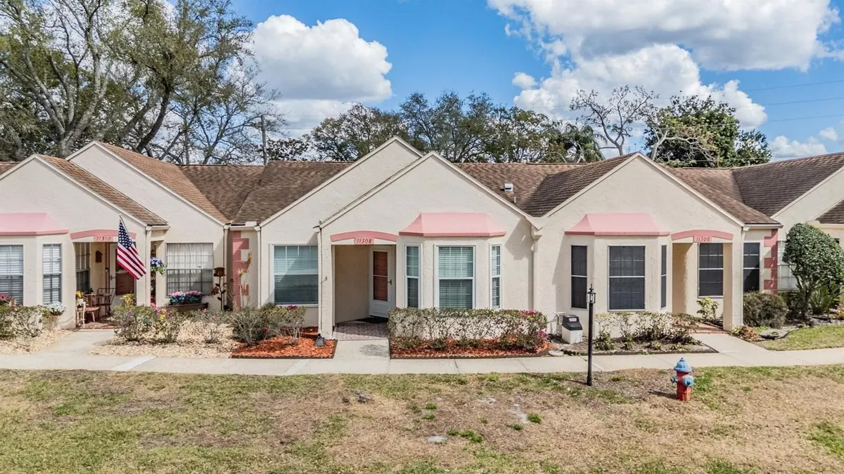 Property Slideshow image 1 of 33 | 11308 versailles ln c, Port Richey, FL, 34668