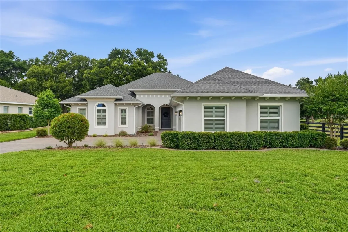 Property Slideshow image 1 of 74 | 5066 greens dr, Lady Lake, FL, 32159