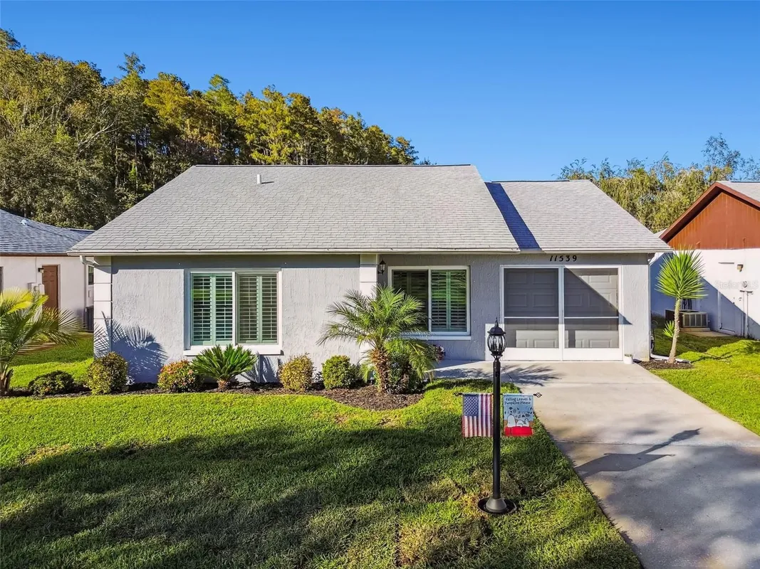 Property Slideshow image 1 of 49 | 11539 scotch pine dr, New Port Richey, FL, 34654