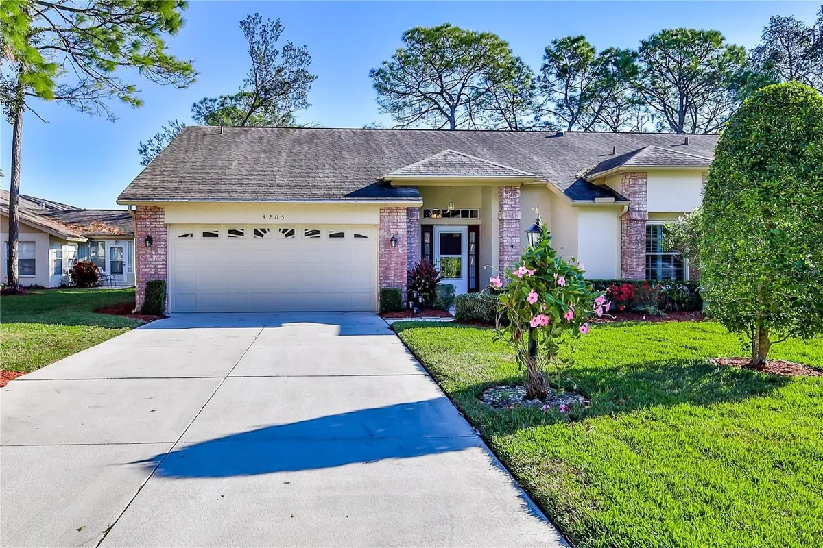 Property Slideshow image 1 of 62 | 3205 appleblossom trl, Spring Hill, FL, 34606