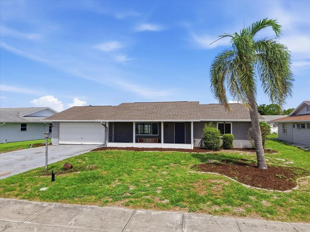 Property Slideshow image 1 of 32 | 1404 seton hall dr, Sun City Center, FL, 33573