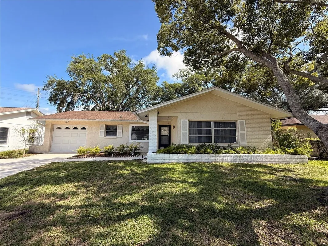 Property Slideshow image 1 of 43 | 8634 winding wood dr, Port Richey, FL, 34668