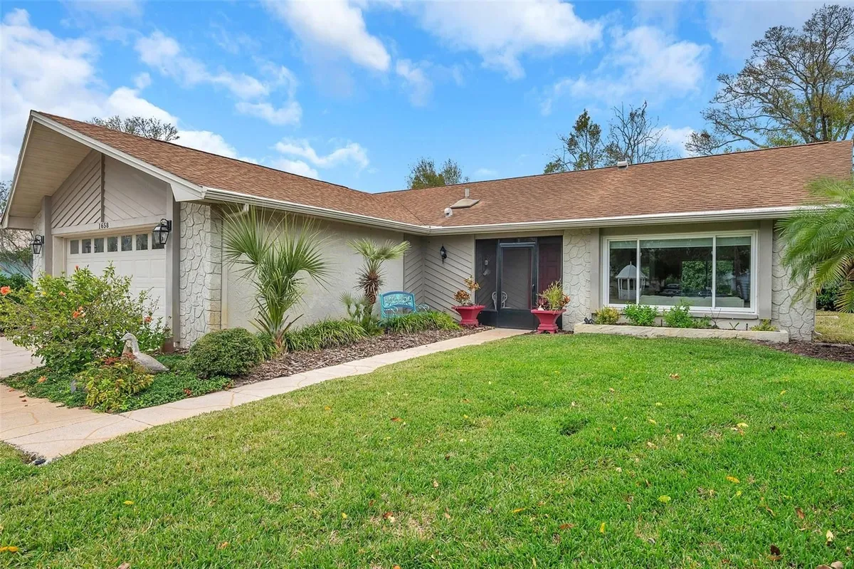 Property Slideshow image 1 of 72 | 1658 macdonnell ct, Palm Harbor, FL, 34684