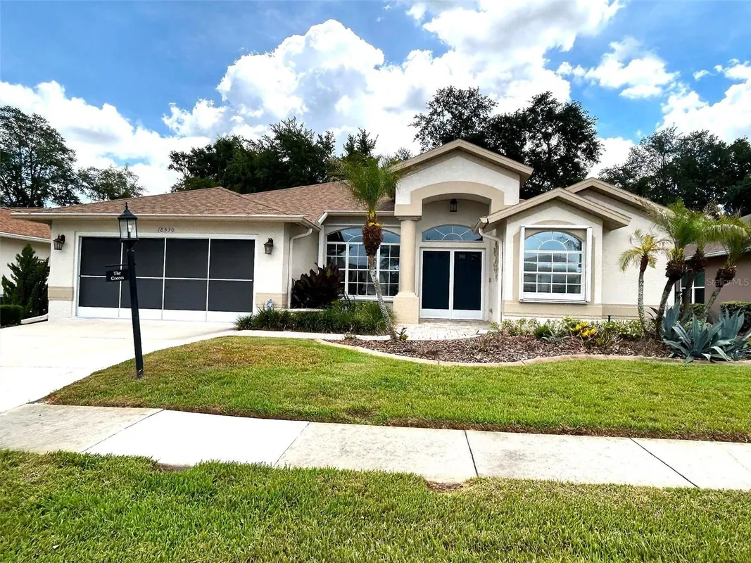 Property Slideshow image 1 of 44 | 18530 water lily ln, Hudson, FL, 34667