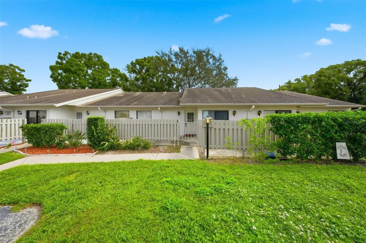 Property Slideshow image 1 of 42 | 1725 pine ridge way 518e, Palm Harbor, FL, 34684