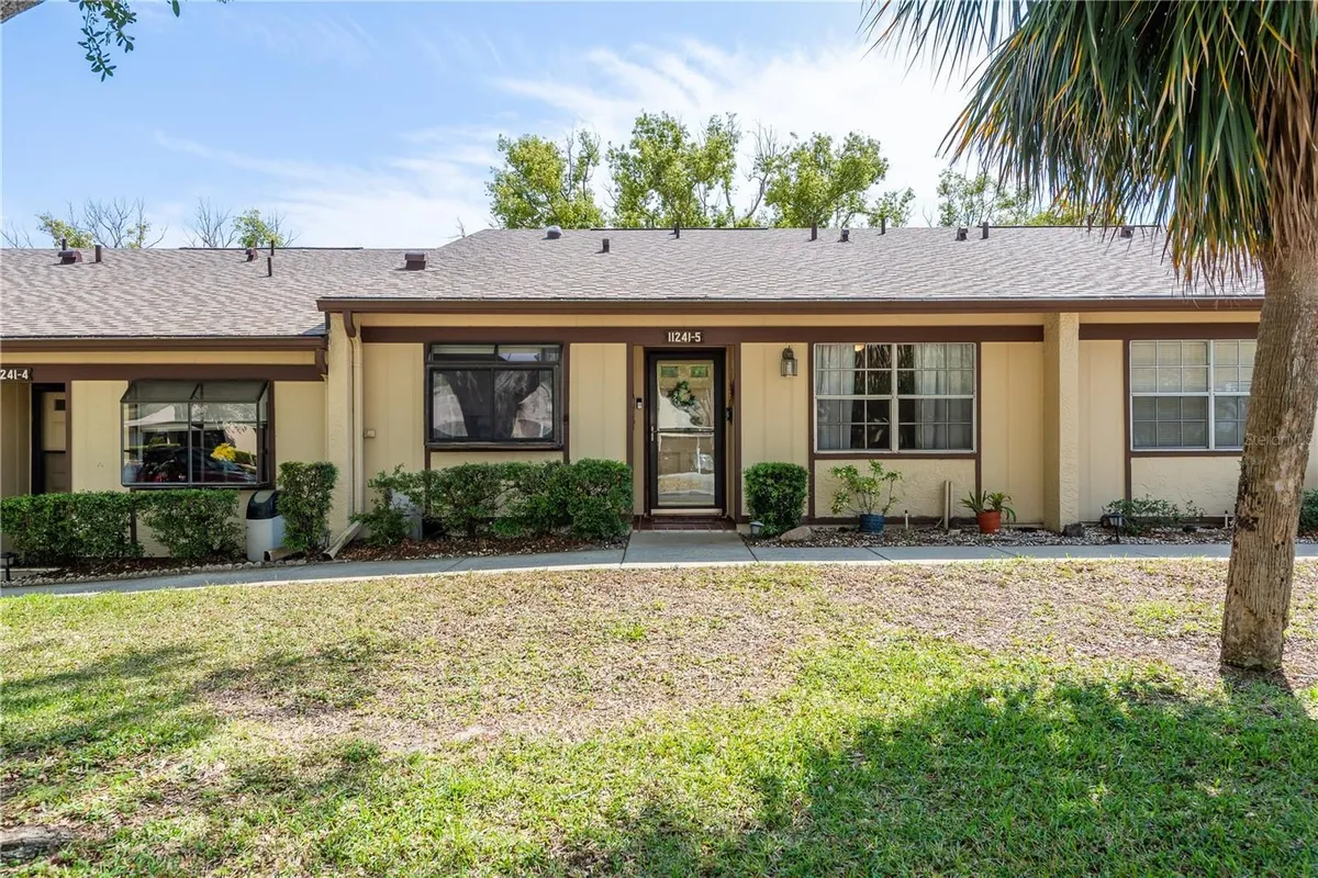 Property Slideshow image 1 of 49 | 11241 dollar lake dr 5, Port Richey, FL, 34668