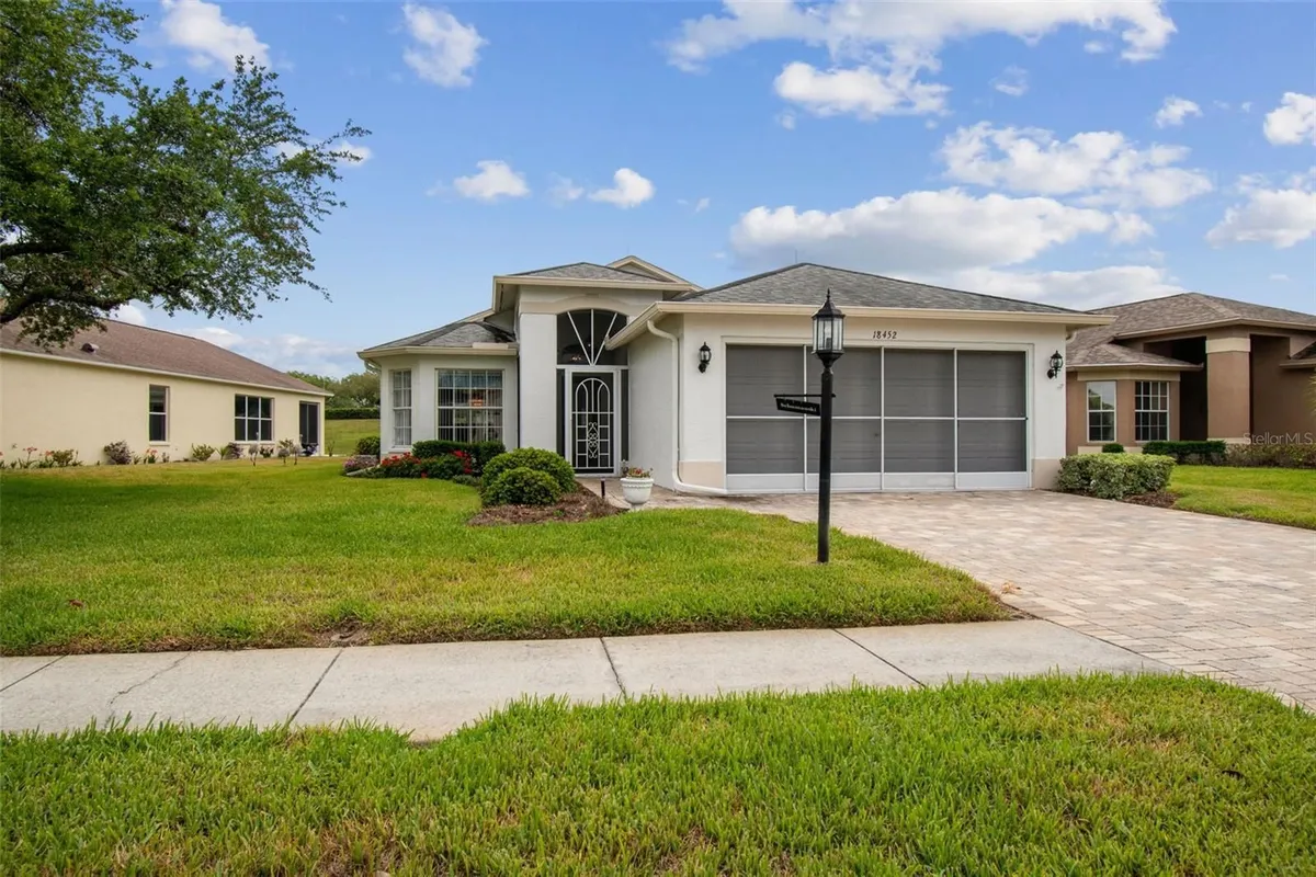 Property Slideshow image 1 of 68 | 18452 fairway green dr, Hudson, FL, 34667