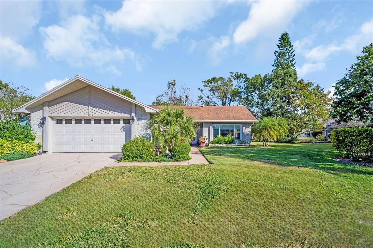 Property Slideshow image 1 of 61 | 1658 macdonnell ct, Palm Harbor, FL, 34684