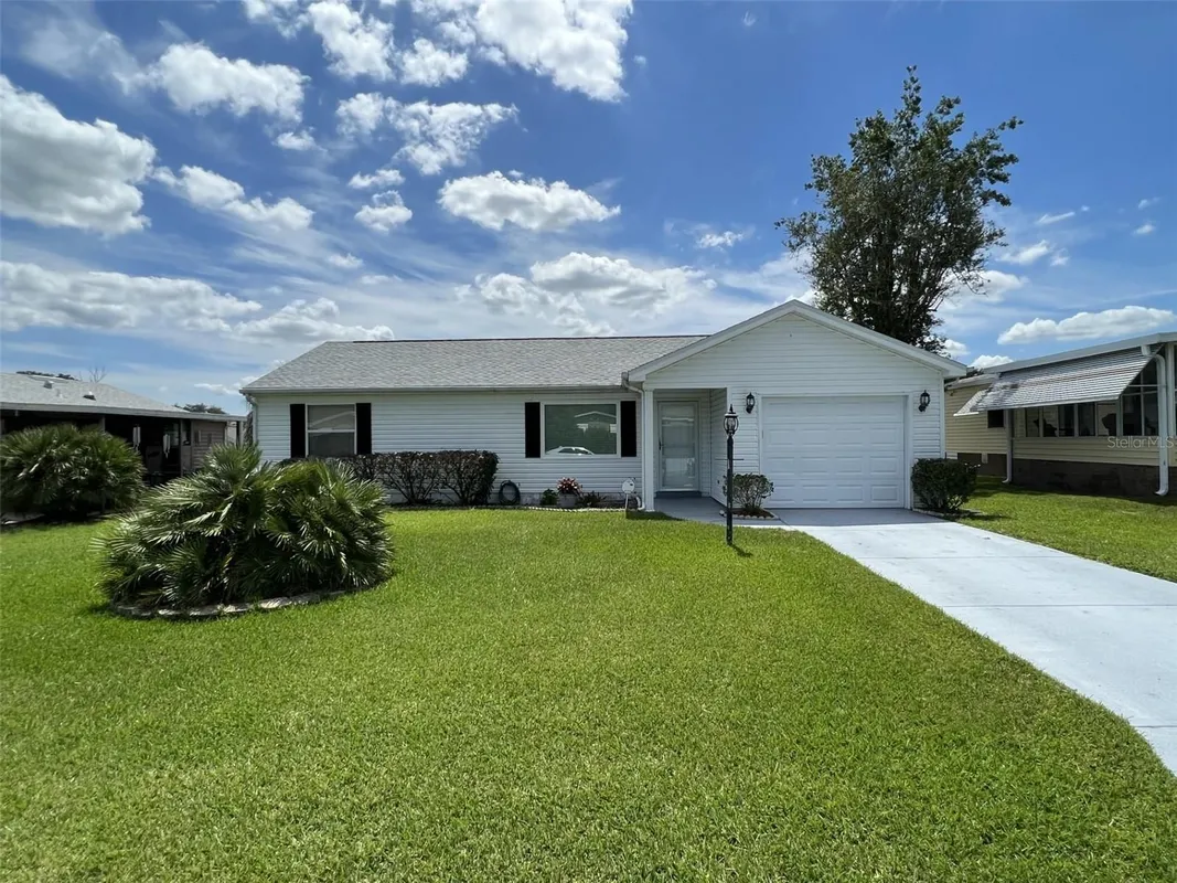 Property Slideshow image 1 of 9 | 1232 zapata pl, Lady Lake, FL, 32159