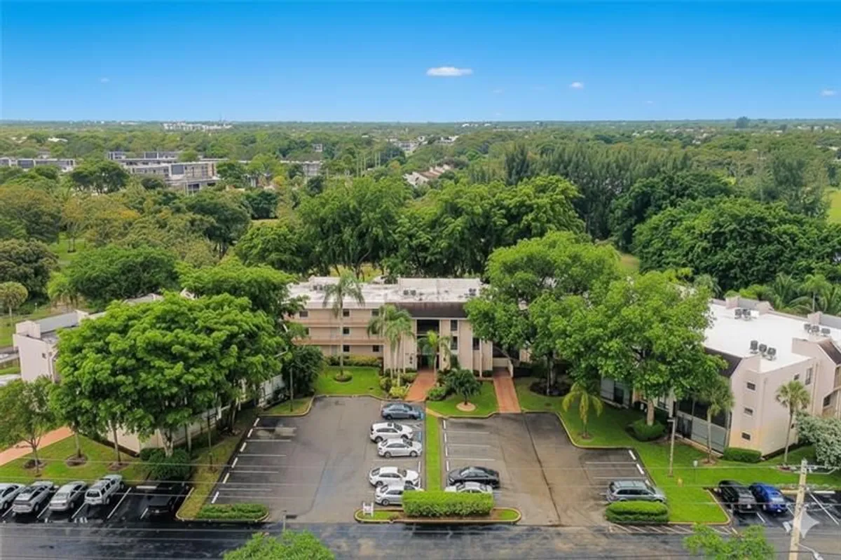 Property Slideshow image 1 of 32 | 8150 w mcnab rd 312, Tamarac, FL, 33321