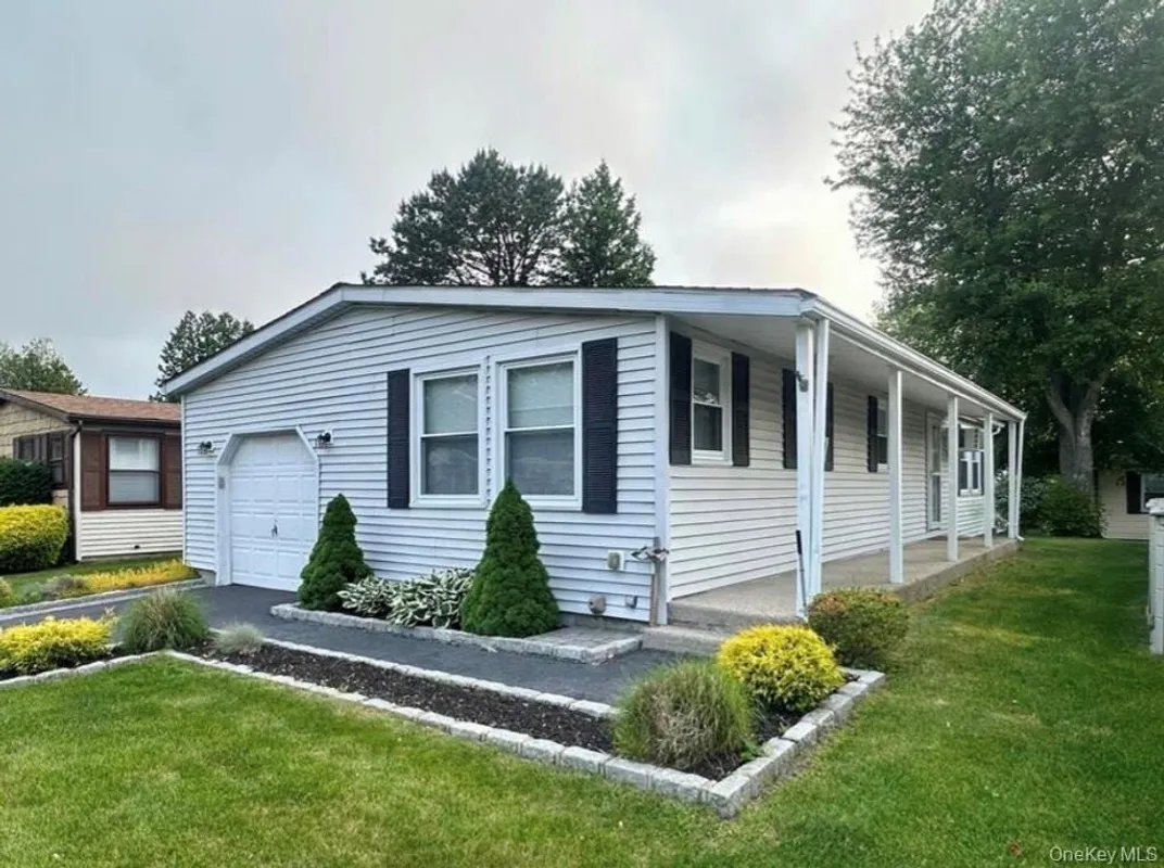 Property Slideshow image 1 of 14 | 16 village cir, Brookhaven, NY, 11949