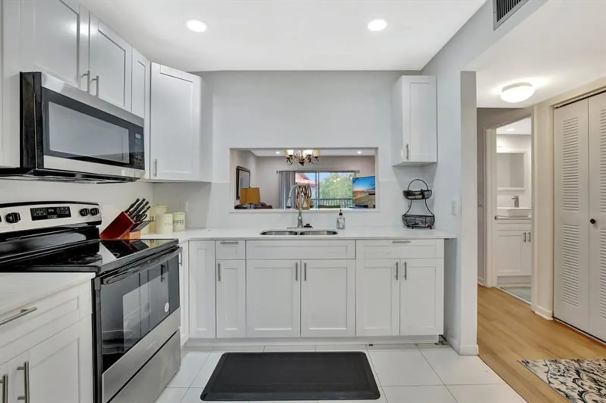 Property Slideshow image 1 of 35 | 1200 sw 124th ter 404 o, Pembroke Pines, FL, 33027