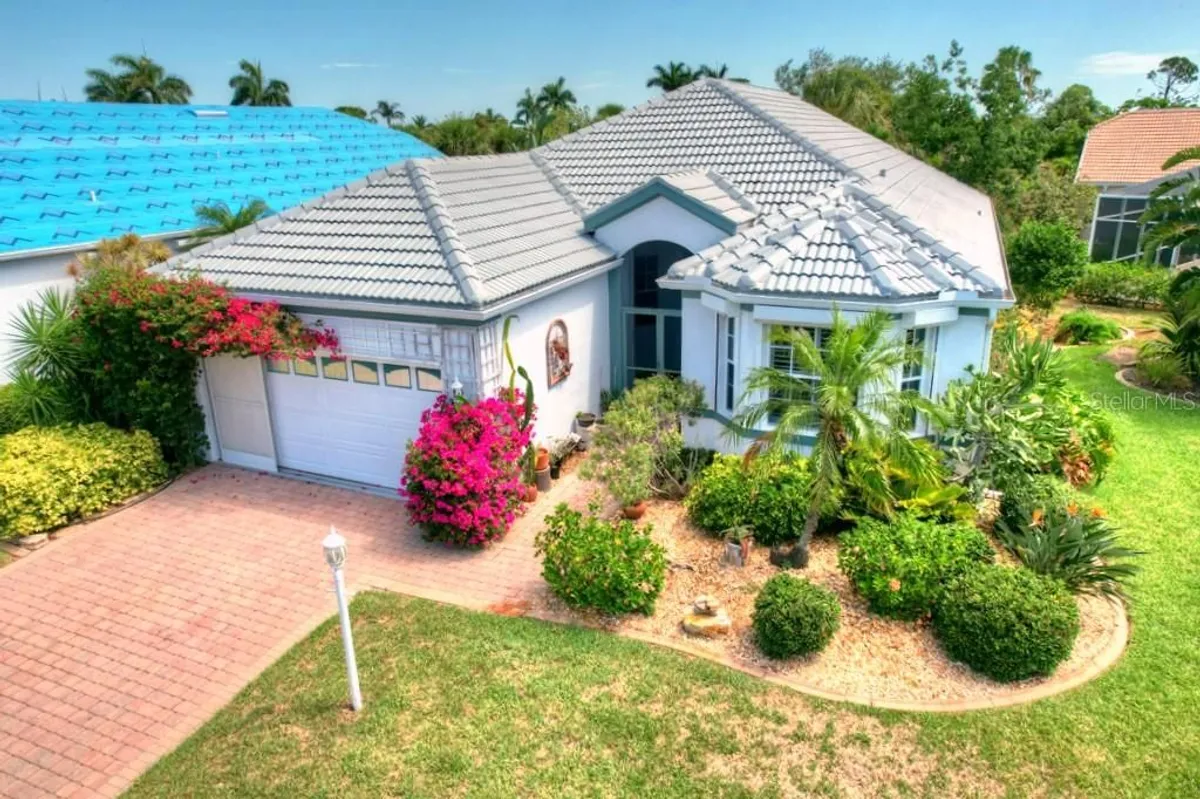 Property Slideshow image 1 of 54 | 17844 hibiscus cove ct 11, Punta Gorda, FL, 33955
