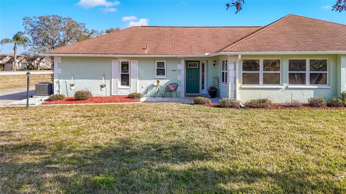 Property Slideshow image 1 of 44 | 11431 dollar lake dr 1, Port Richey, FL, 34668