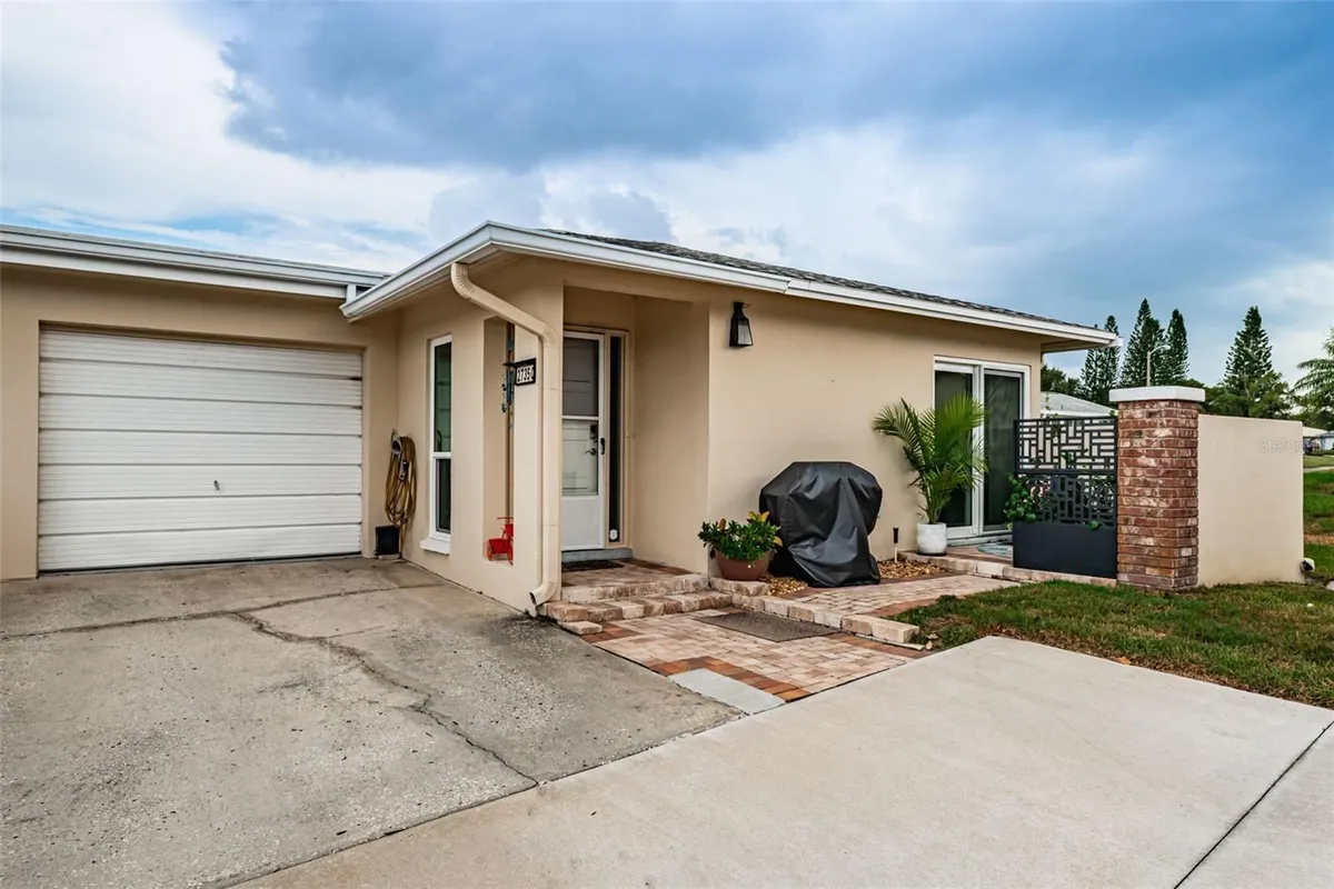 Property Slideshow image 1 of 43 | 2735 sherbrooke ln c, Palm Harbor, FL, 34684