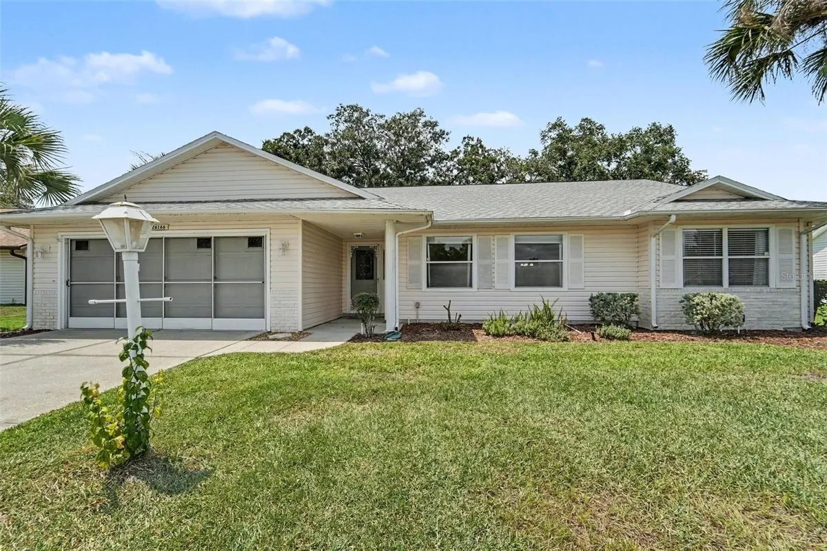 Property Slideshow image 1 of 31 | 26166 newcombe cir, Leesburg, FL, 34748