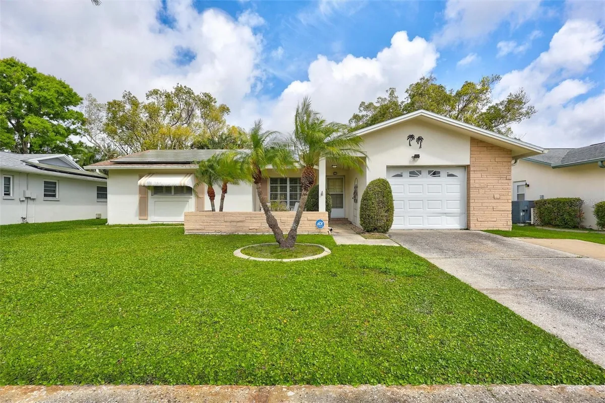 Property Slideshow image 1 of 66 | 2955 briar cliff dr, Palm Harbor, FL, 34684