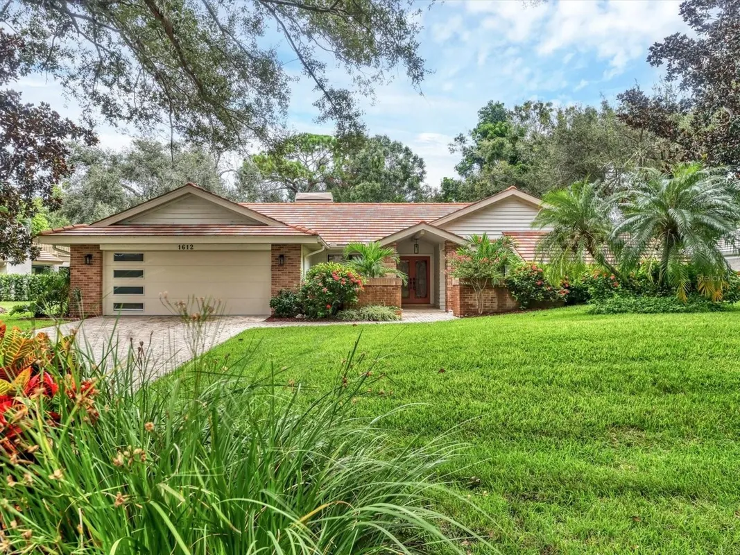 Property Slideshow image 1 of 46 | 1612 pine harrier cir, Sarasota, FL, 34231
