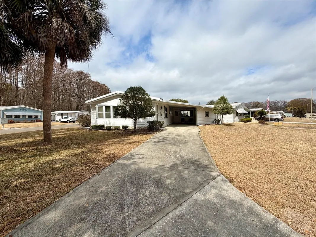 Property Slideshow image 1 of 33 | 103 lyonia ln, Wildwood, FL, 34785