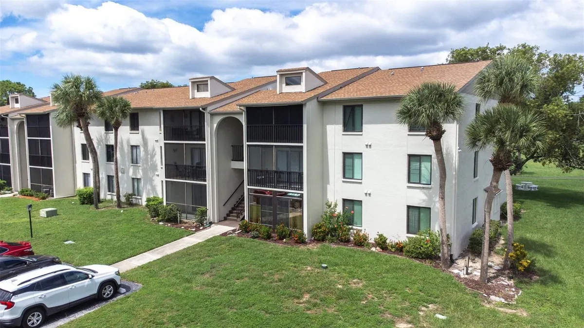 Property Slideshow image 1 of 34 | 1871 pine ridge way w apt h3, Palm Harbor, FL, 34684