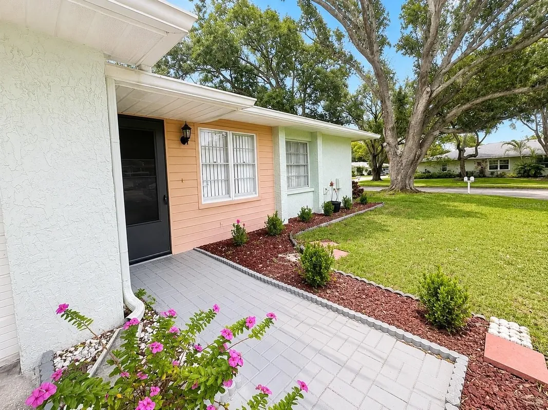 Property Slideshow image 1 of 23 | 1131 orange tree cir c, Palm Harbor, FL, 34684