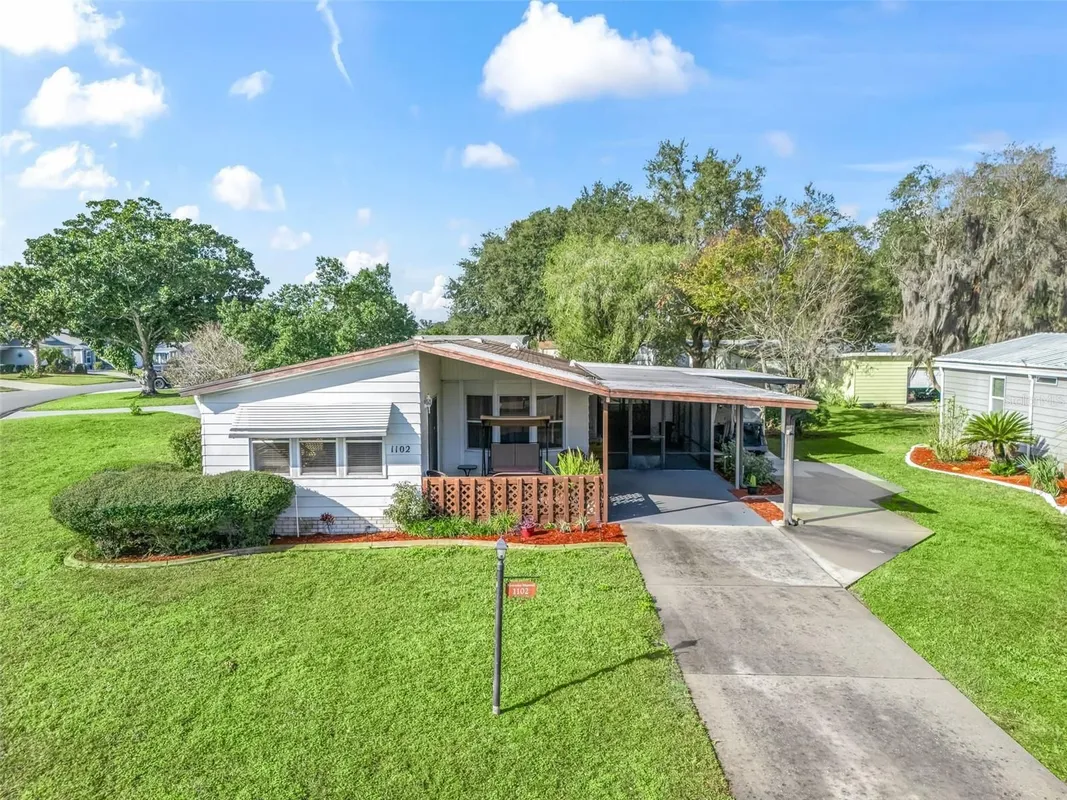 Property Slideshow image 1 of 38 | 1102 dustin dr, Lady Lake, FL, 32159
