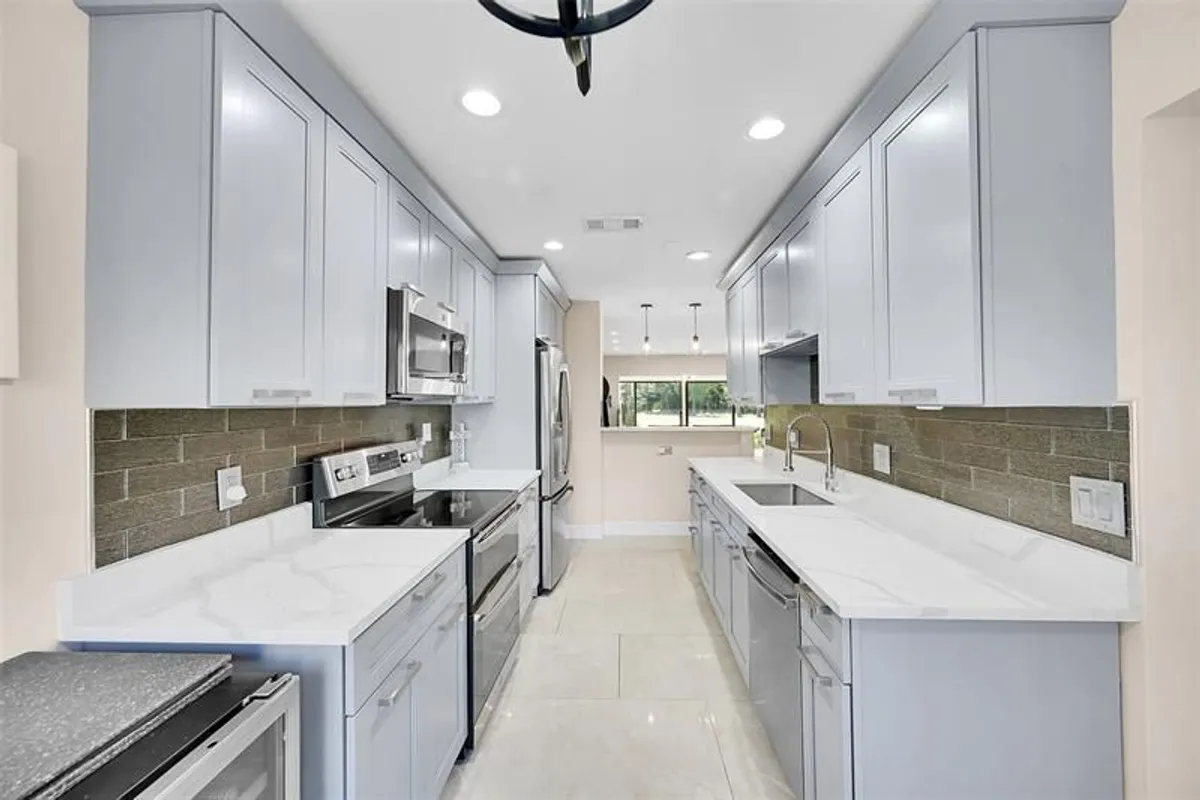 Property Slideshow image 1 of 61 | 21207 lago cir d, Boca Raton, FL, 33433