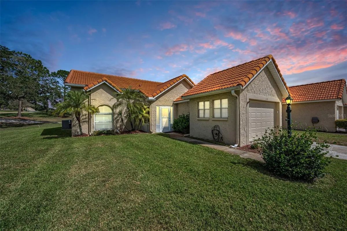 Property Slideshow image 1 of 58 | 1199 woodfield ct, Palm Harbor, FL, 34684