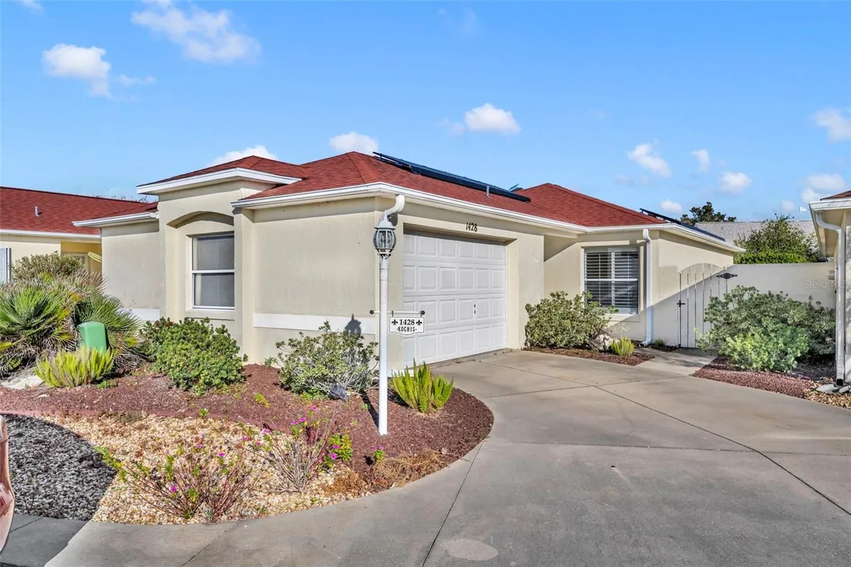 Property Slideshow image 1 of 54 | 1428 almanza dr, Lady Lake, FL, 32159