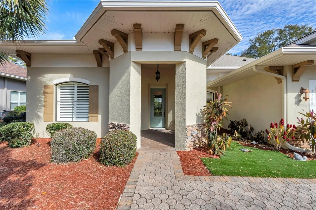 Property Slideshow image 1 of 79 | 5203 grove mnr, Lady Lake, FL, 32159