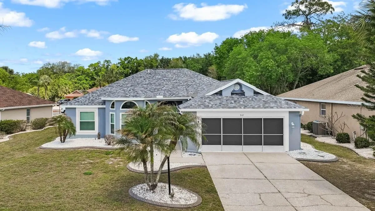 Property Slideshow image 1 of 41 | 327 caloosa woods ln, Sun City Center, FL, 33573