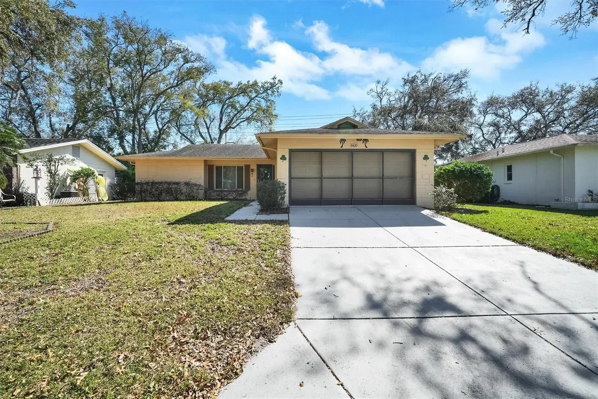 Property Slideshow image 1 of 45 | 8420 winding wood dr, Port Richey, FL, 34668