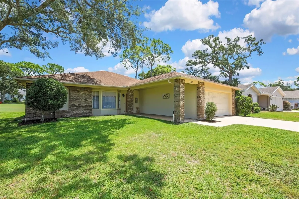 Property Slideshow image 1 of 46 | 7103 crown oaks dr, Spring Hill, FL, 34606